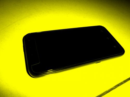 Cell Phone - Yellow Background