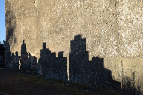 cemetery  shadow  wall