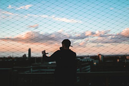 chainlink fence sunset