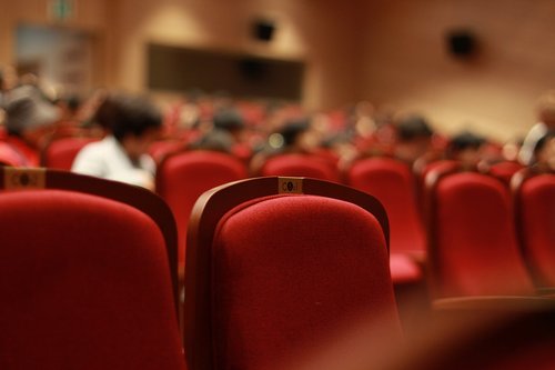 chair  auditorium  onlookers