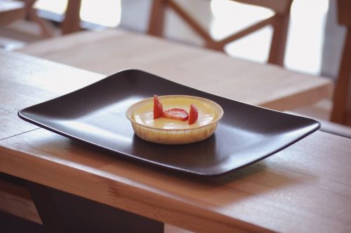 cheesecake with strawberry plated dessert delicatessen