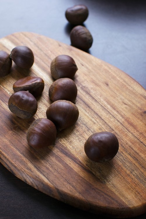 chestnuts  wooden board  food