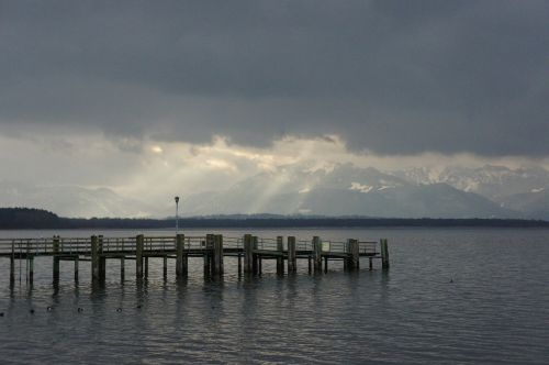 chiemsee mountains sun