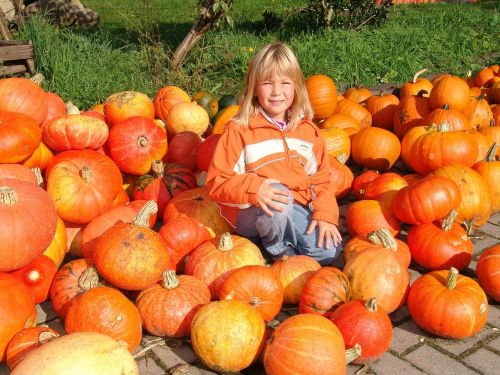 child pumpkin orange