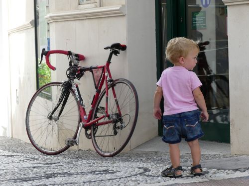 child boy road bike
