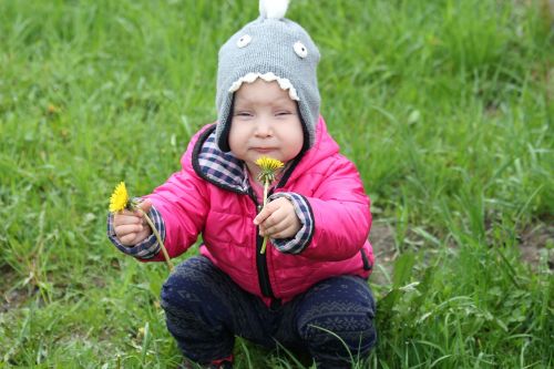 child dandelions baby girl