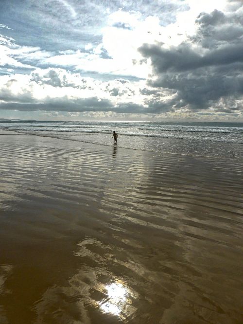 child playing beach