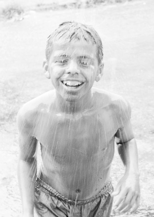 child playing rain