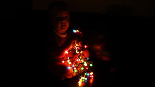 Child And Christmas Lights