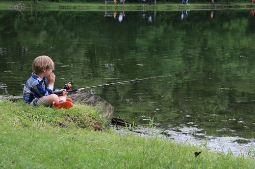 child fishing  child by pond  fishing