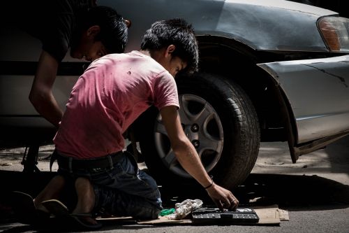 child labor car mechanic cars