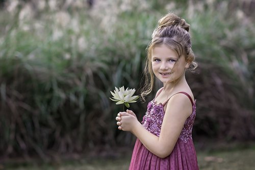 child portrait  girl  flower