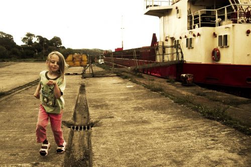 child running boat harbour