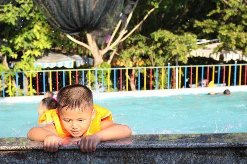 children summer outdoor swimming pool