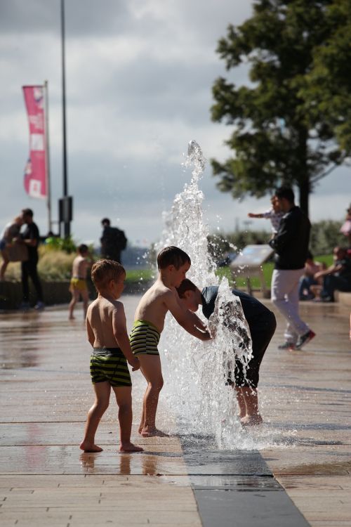 children playing water