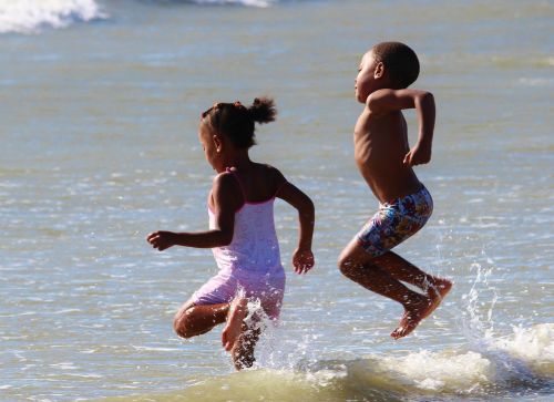 children play beach