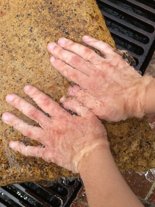 children hands water