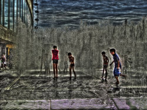 Children Playing In Fountain
