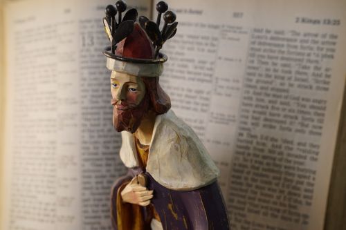 christian figurine the king open bible