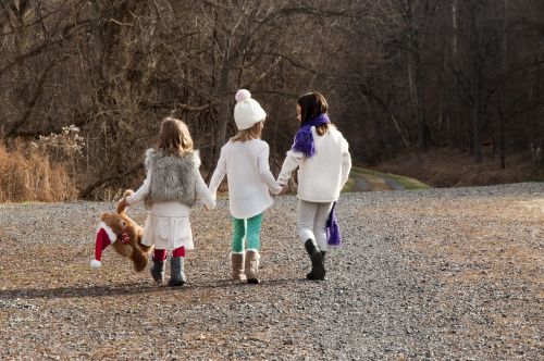 christmas sisters walking