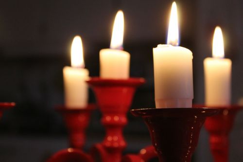 christmas lights in red candlestick light candle wax
