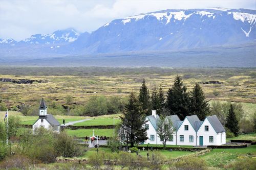 church landscape mountains