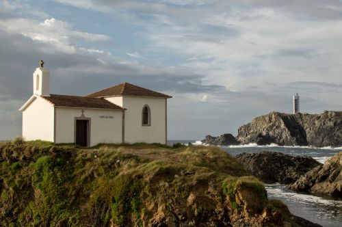 Church And Lighthouse At The Coast