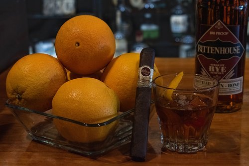 cigar  old fashioned  oranges