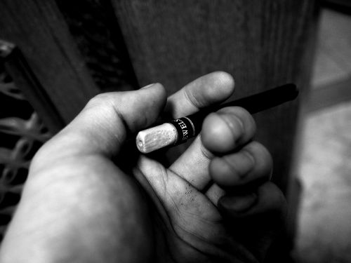 cigarette black and white photograph hand