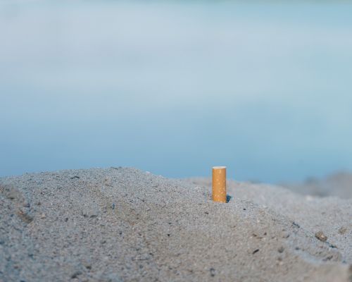 cigarette beach garbage