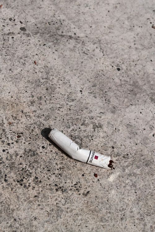 cigarette butts concrete floor litter anywhere
