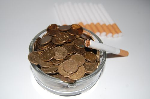cigarettes ashtray money