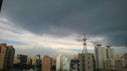 city dark clouds weather