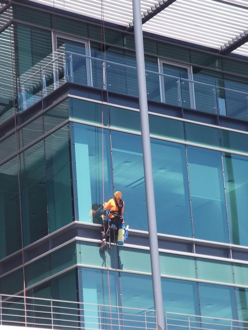 cleaning window building