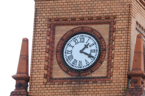 clock  red brick  tower