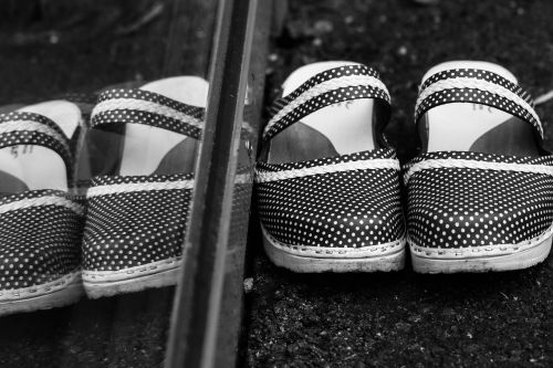 clogs footwear window reflection