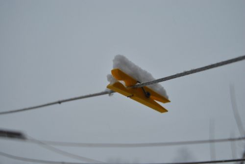 clothespin hang snow