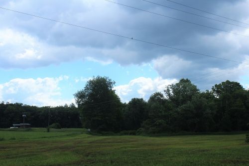 clouds farm land sky