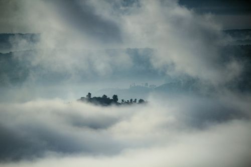 clouds tree peak