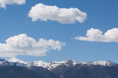 clouds mountains snowy