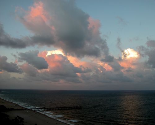 clouds clouds over atlantic ocean pier