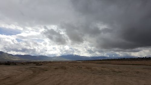 clouds desert mountains