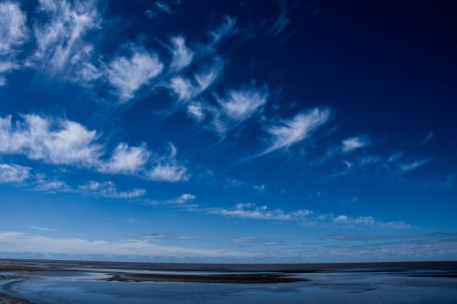 clouds blue river