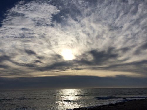 clouds beach spain