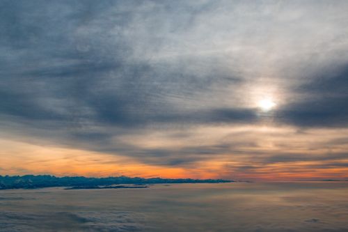 clouds above the clouds fly