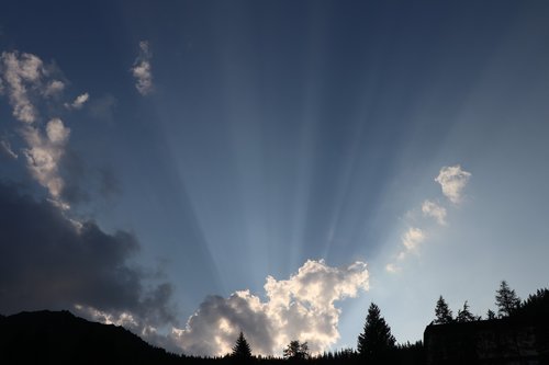 clouds  the rays  buried