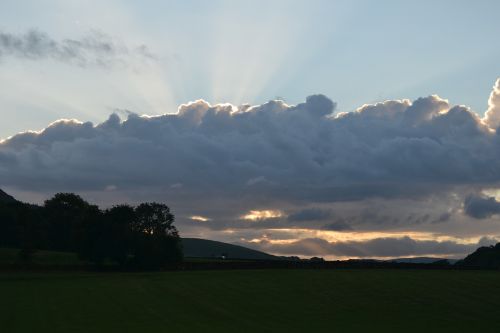 clouds sunrays sunbeam