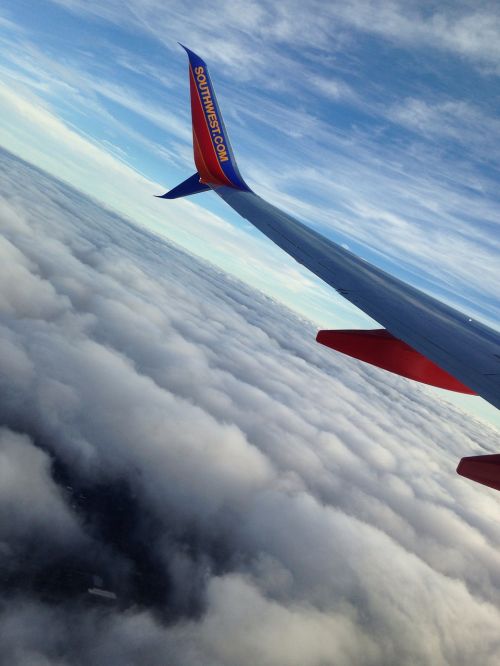clouds plane airplane