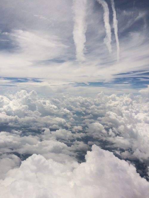 clouds plane sky