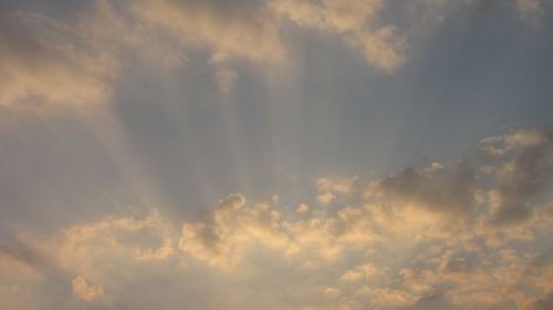 clouds rays sunbeam